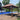 11×11ft Outdoor Pop - Up Gazebo – 2 - Tier Soft Top with Removable Zipper Netting, 4 Sandbags (Brown)MUTUKISPACE