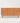 Nine-Drawer Wood Dresser — studio presentation with AI-edited background