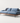 Wood-Frame Upholstered Sofa — studio presentation with AI-edited background