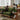 Luxurious Dark Green Sofa with Natural Wood Accents and Goose Down Cushions fyx - 825MUTUKISPACE