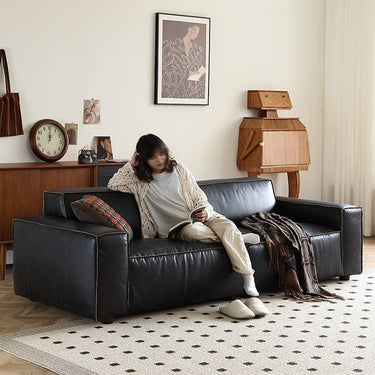 Luxurious Black Genuine Leather Sofa with Solid Wood Frame and Plush Down Filling Hersa - 1644MUTUKISPACE