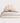 Scalloped Upholstered Bed — studio presentation with AI-edited background