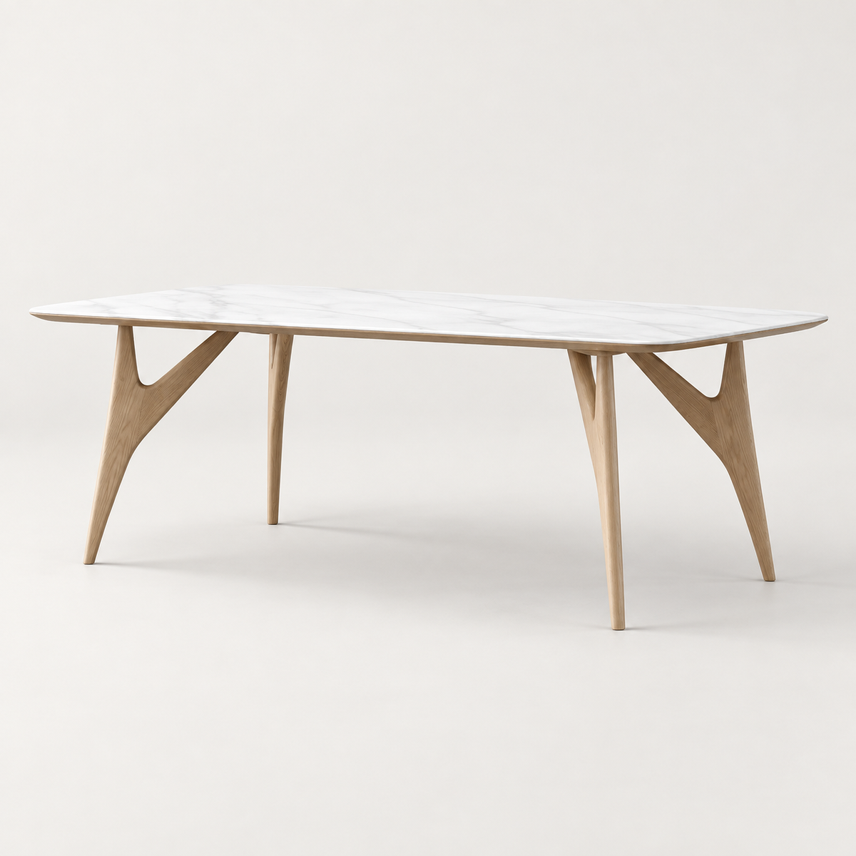 Sintered Stone & Ash Dining Table — studio presentation with AI-edited background