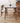 Sleek Matte White Sintered Stone & Ash Wood Dining Table – Modern Elegance for Your Home fmbs - 002MUTUKISPACE