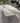 Sleek Sintered Stone Dining Table – Stainless Steel Base and Modern Multi - Layer Design hbso - 3017MUTUKISPACE