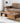 Elegant Brown Tung Wood Coffee Table with Metal Accents hym - 490MUTUKISPACE