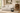 AI-styled living room featuring a beige two-seat sofa, a compact black HSXZ-2176 round accent table and a MU-XCZSG glass display cabinet. Decorative accessories are not included.