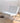 Sleek White Stainless Steel Chair with Premium Leathaire Upholstery my - 382MUTUKISPACE